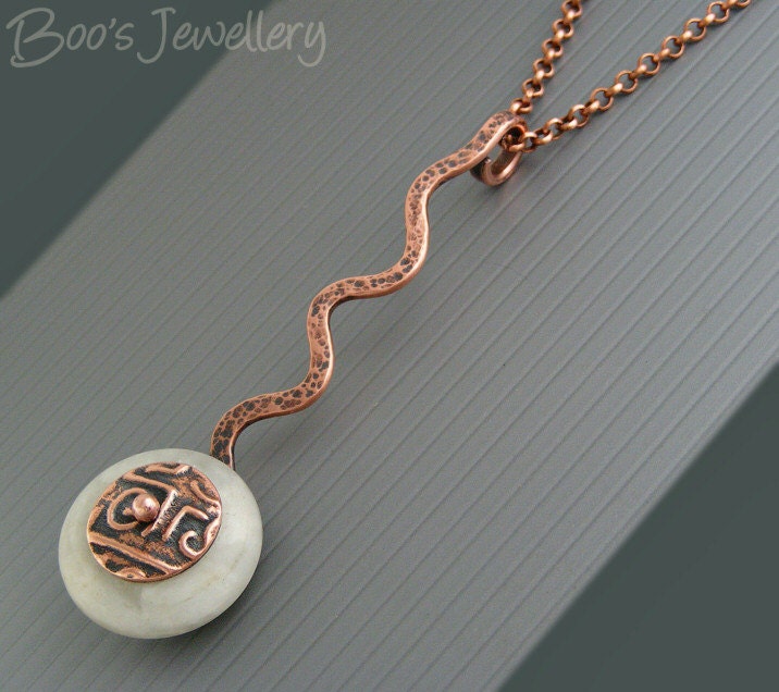 Antiqued copper and moonstone squiggle pendant on chain with antiqued copper beadcap