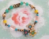 Anna.vintage enamel, rhinestone, floral, beaded bracelet. Tiedupmemories