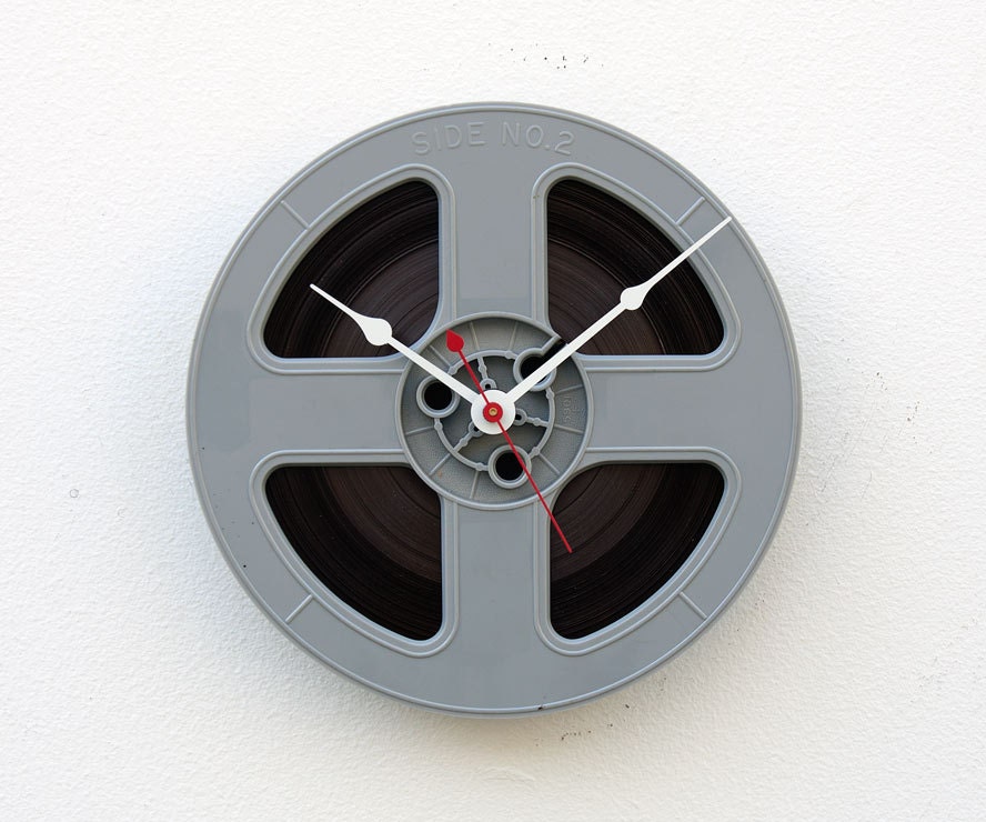 Clock made from a recycled magnetic tape reel