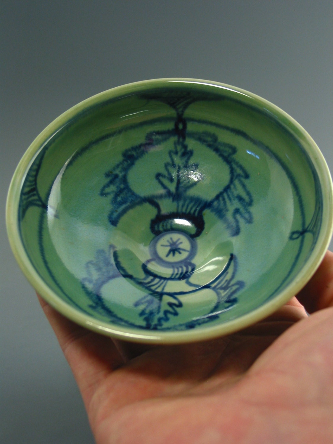 Teacup, porcelain with cobalt underglaze and celadon glaze