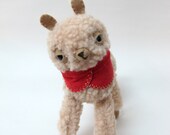Small Wooly Alpaca in a Fuschia Embroidered Cape