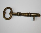 antique brass key three inches long