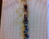 Silver ball pendant with Copper forged bail on Sterling chain