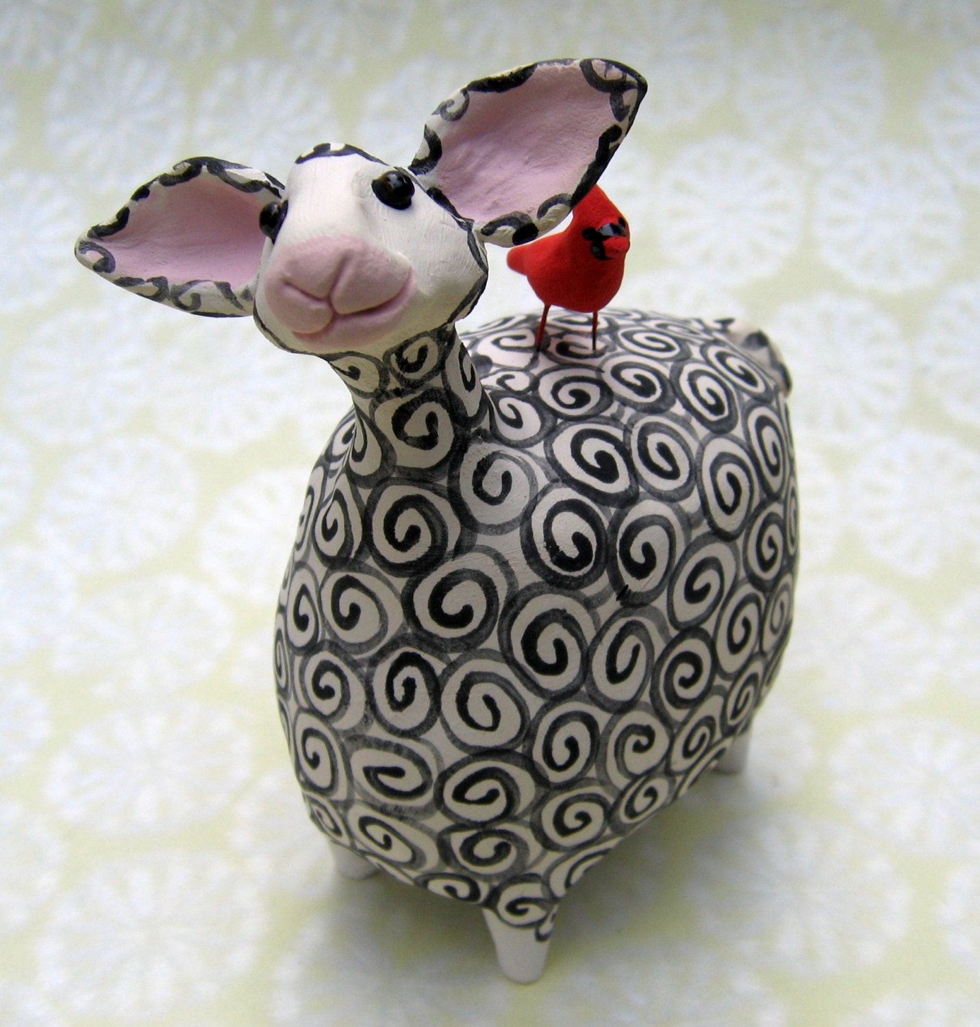 Black and white whimsical ceramic sheep with cardinal,  Thank Ewe with cardinal