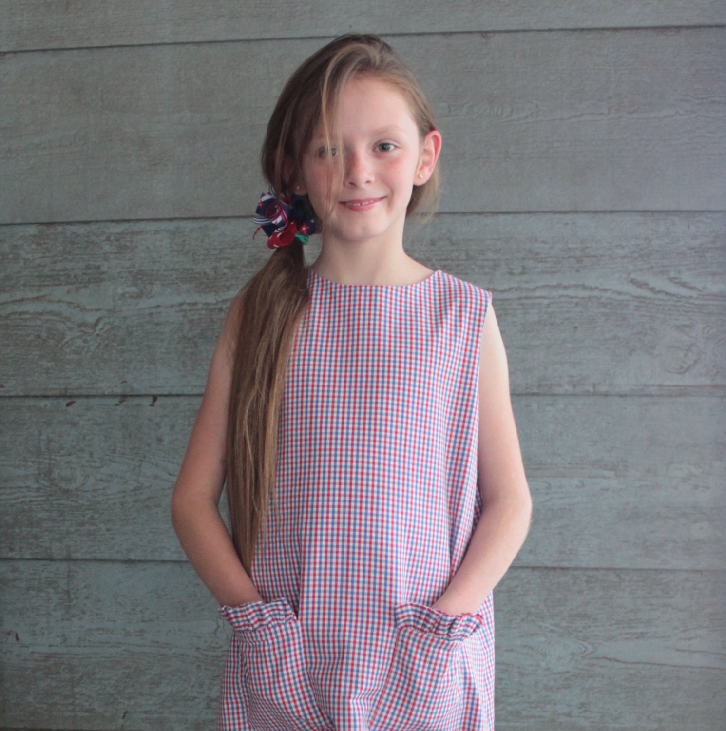 Girl's Dress with Ruffle Pockets and Button Back