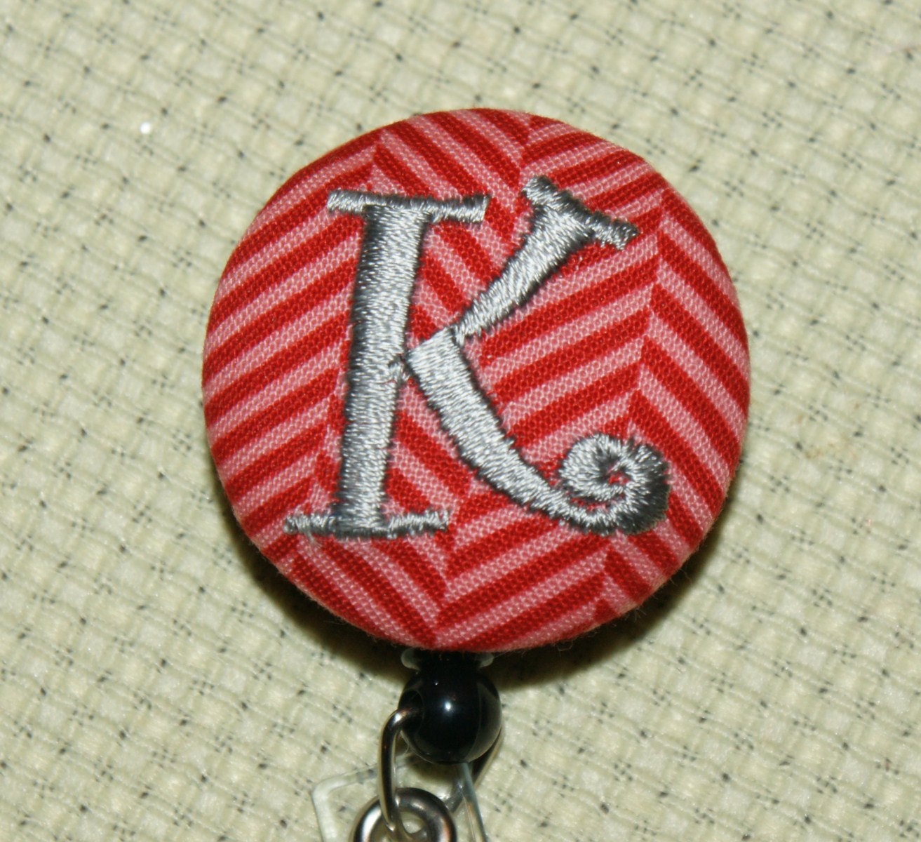 Many fabrics to design YOUR Badge Reel. Monogrammed single letter,