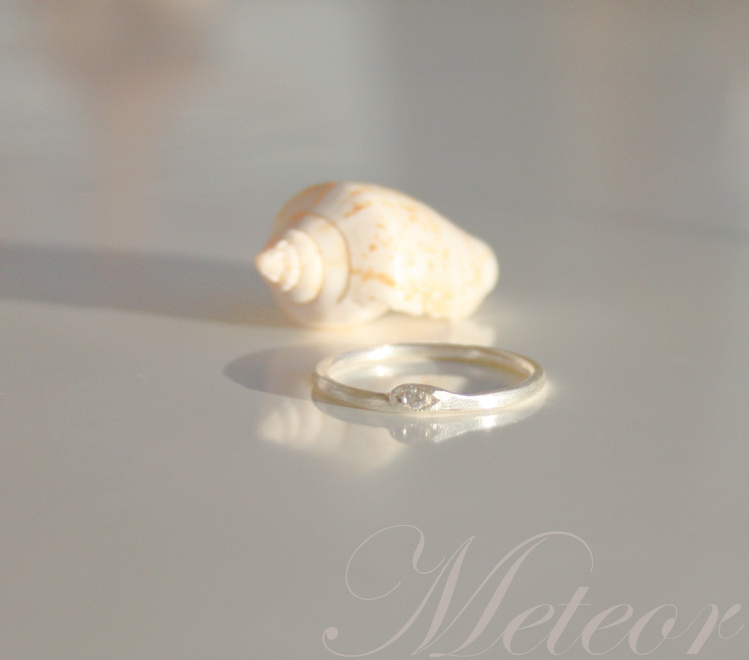 Size 6 sterling silver stacking ring with 1mm. white (colorless) zirconia