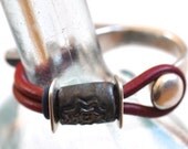 Burgundy Leather, SRA Black Metallic Lampwork Bead and Silver Metal Bracelet