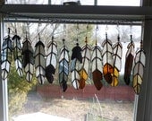 the new latest crop  Indian Chief  Eagle Feather  stained glass with Beads in blacks and browns