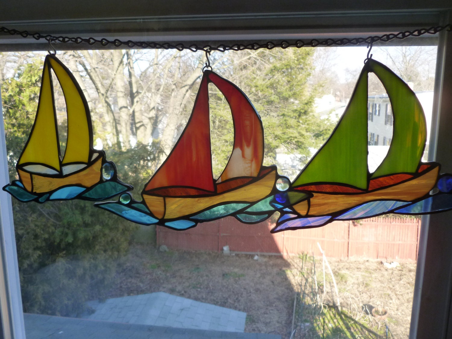 Stained Glass Sailboat Light Catcher on waves  green yellow or red