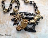 Mourning Glory Steampunk Flower Necklace - Black Enamel Necklace with Gold Tone Watch Gears and Flowers
