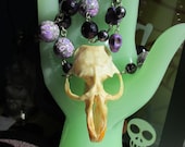 Violet Muskrat necklace