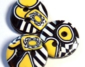 Black, Yellow, and White Graphic Buttons No. 18