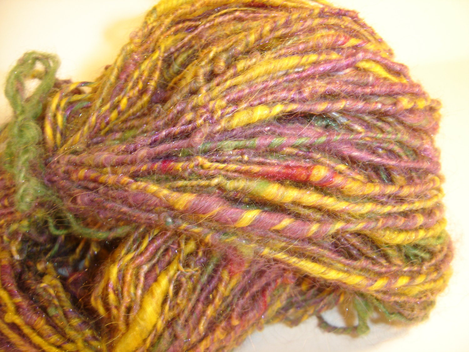 Art yarn, Yarn, Hand Spun Hand dyed Violets 2.5 oz  105  yardsCore Spun Llama, Alpaca, Bamboo & firestar violet, green