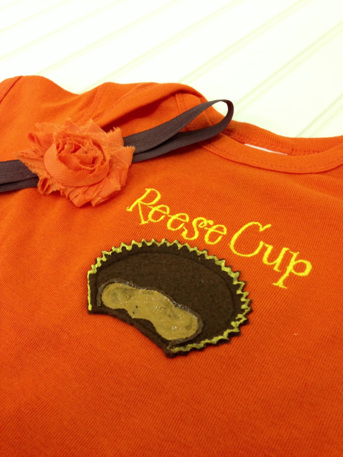 Reese Cup peanut butter cup onesie with bow and headband