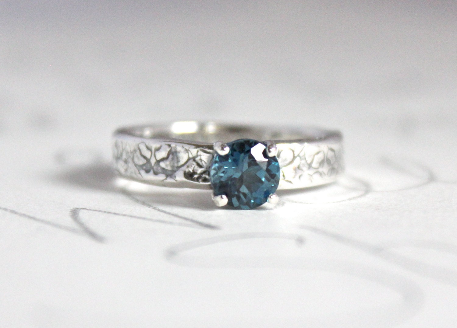 london blue topaz engagement ring . tudor rose engraved . recycled silver prong ring . size 7 3/4 ready to ship . unique engagement ring