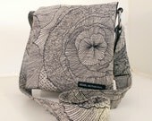 Hip Bag in Black Sketch Flowers fabric. White background with black line drawing. Black ballistic nylon lining. Made in San Francisco.