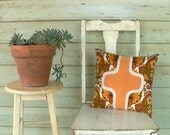 cushion, double reverse applique, courreges in 70s vintage caramel and orange