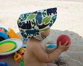 BABY BLUE ZOO, the manly little reversible boy bonnet, by Bella Sol Bebe