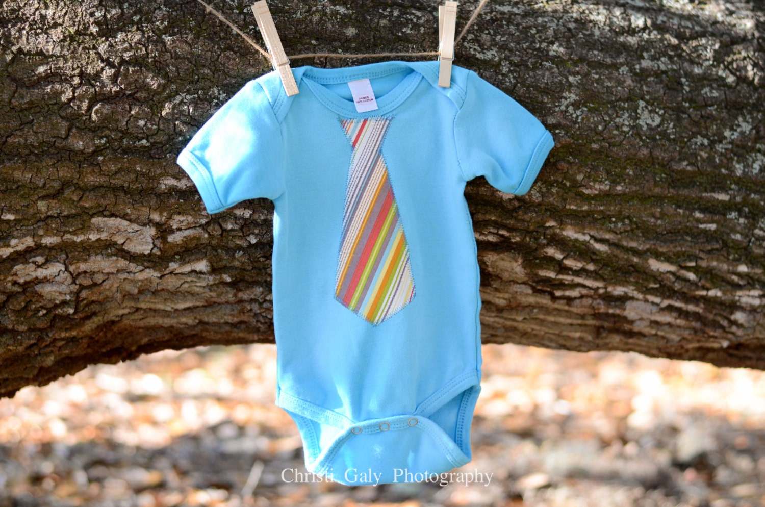 Bright Aqua Onesie with a Striped Tie Applique...Size 0-3 months