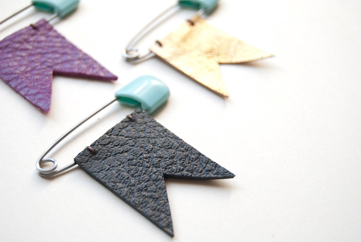 Black leather pennant brooch