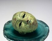 A Mixed Media Sculpture - Tiny Head