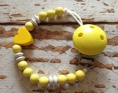Pacifier chain holder