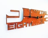 Outnumbered V Modern Wall Clock (Rusted)
