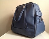 Vintage Blue Samsonite Carry On With Shoulder Strap.