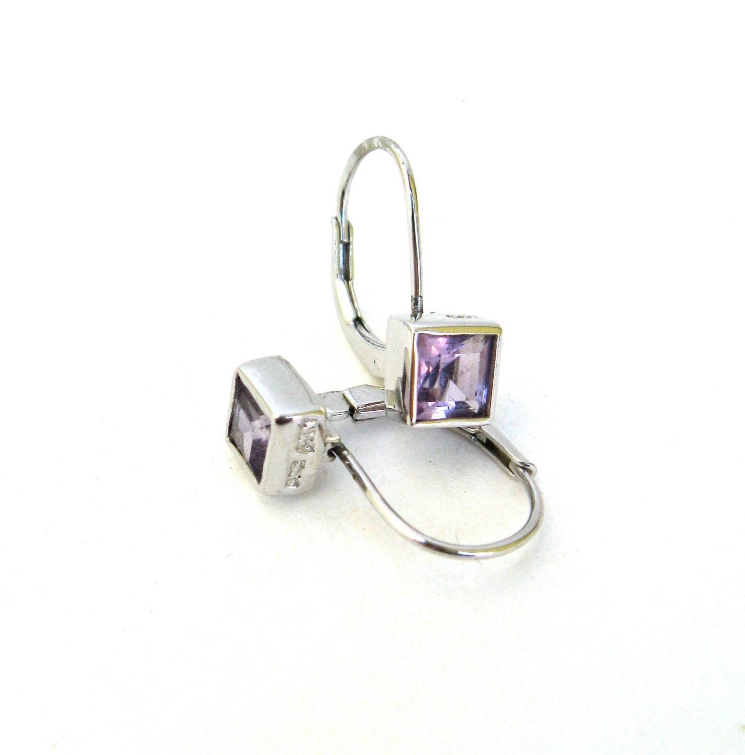 vintage ear wear   .....     sterling silver earrings and amethyst