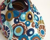 Small Bib in Turquoise Brown and Olive Flowers with Turquoise Fleece Backing