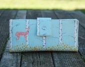 Handmade womens wallet deer on beautiful blue background