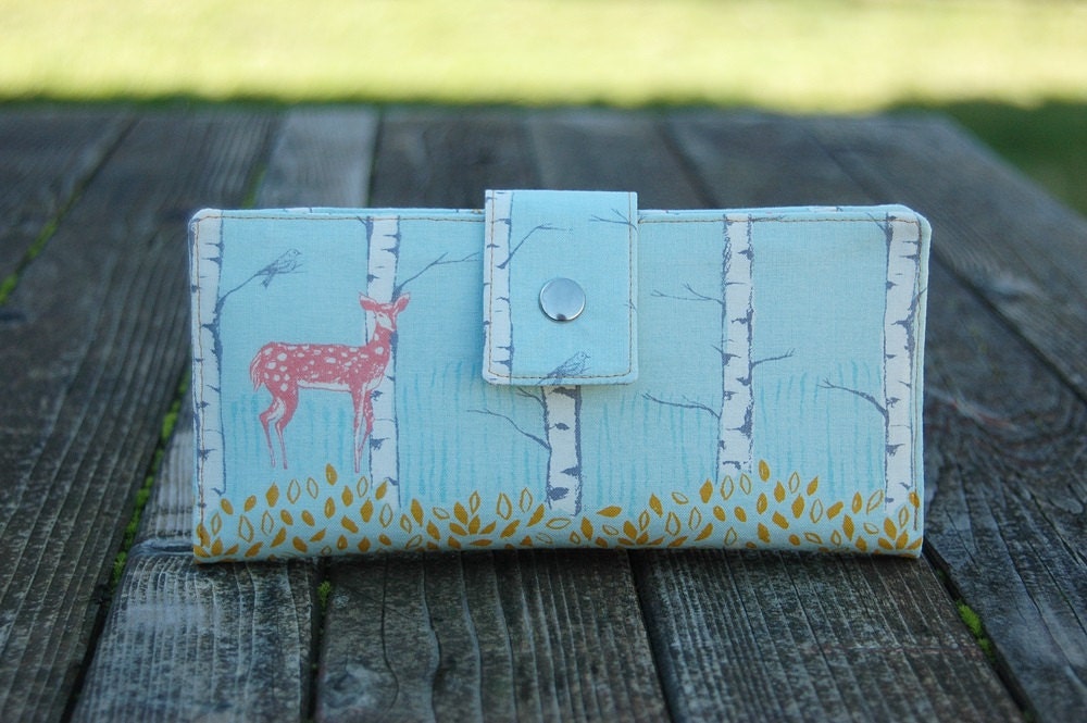 Handmade womens wallet deer on beautiful blue background