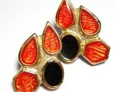 orange and black with gold tone setting pierced vintage earrings O