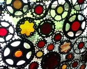 Stained glass bicycle wheel - recycled