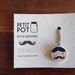 Pendant. Dandy printed in wooden circle