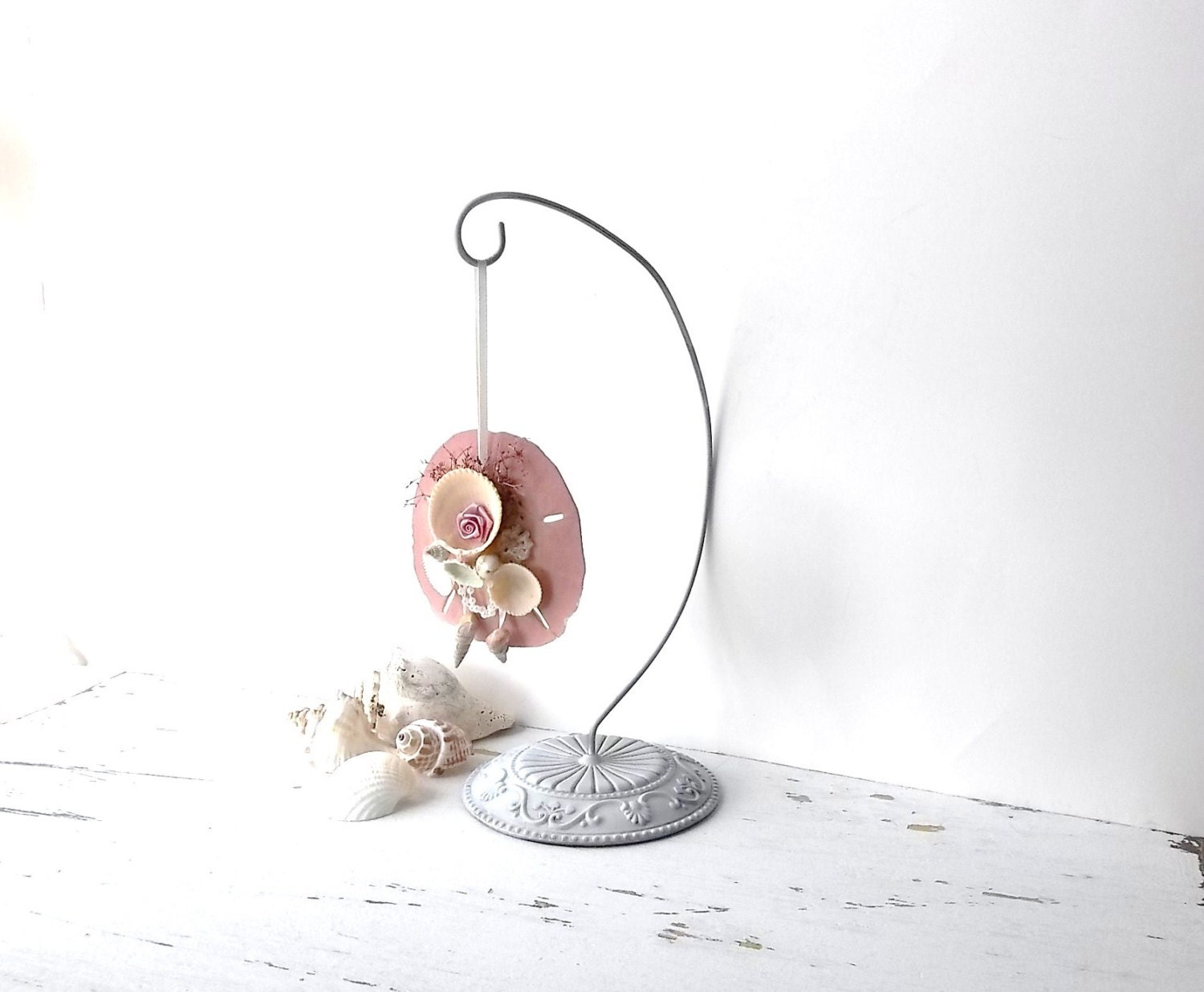 Sea Shell Cottage Home Decor. Shabby chic white pink display. Hanging altered sea shell ornament.