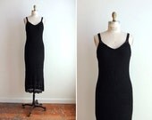 Vintage 1990s designer black knit dress with lining