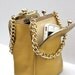 Iconic 60s Bonnie Cashin double kiss lock swing bag // in mustard