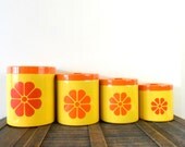 vintage retro yellow and orange floral detailed plastic nesting containers - 1960s - spring