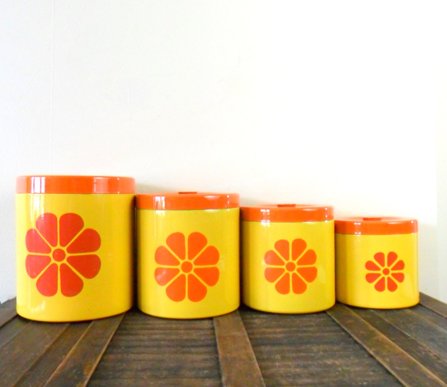vintage retro yellow and orange floral detailed plastic nesting containers - 1960s - spring