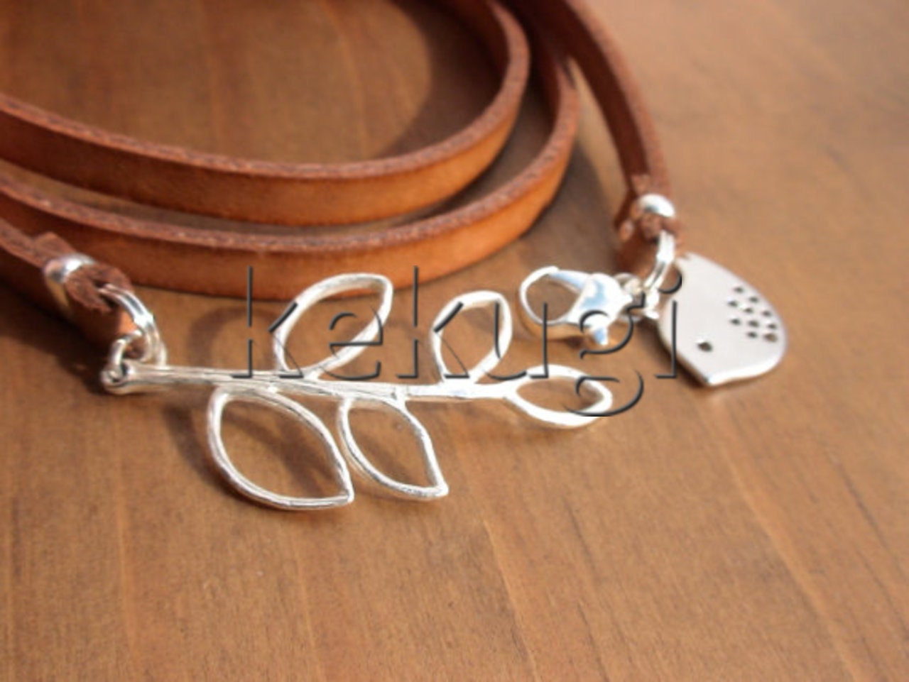 multi wrap camel flat leather bracelet with silver leaf connector and bird