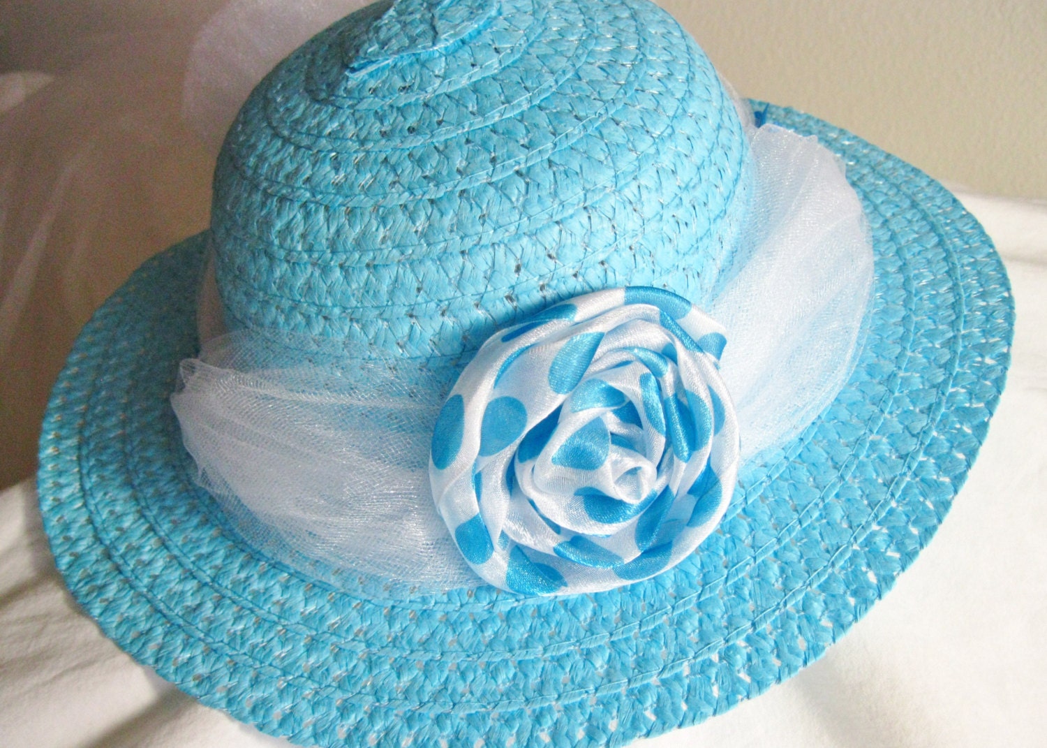 little girls Easter hat in robin egg blue polka dots