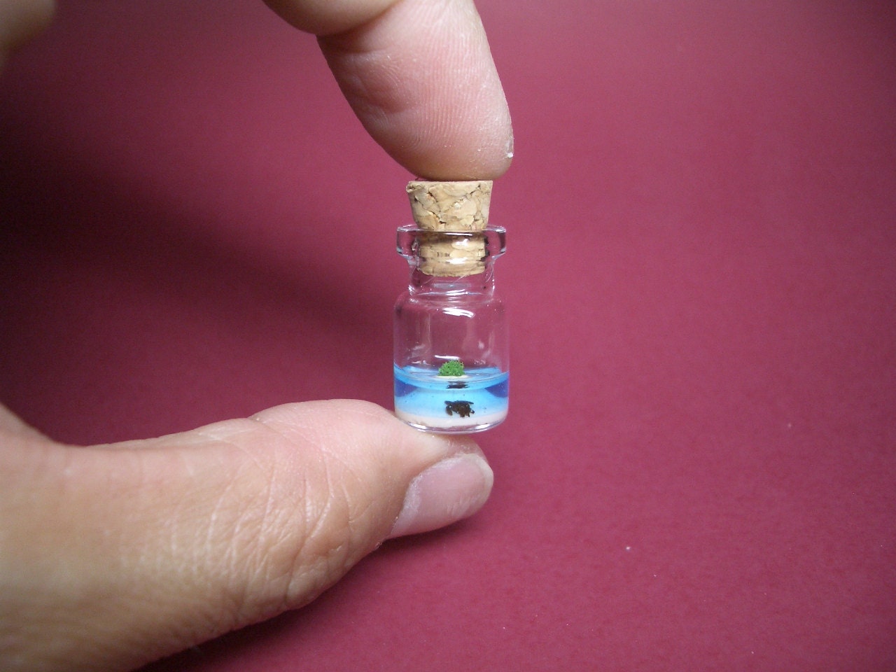 A turtle in an uninhabited island in a tiny bottle blue ver.1