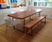 Love this Reclaimed Wood Table... We make them in any size. 72" x 34" x30"  tall