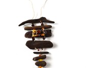 Handmade unique necklace from driftwood and natural Baltic Sea amber