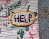 Beaded Help Badge