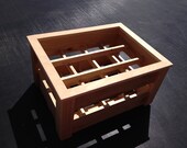 Small wine rack  with frame. Paint / stain your own color or leave it as is. Frame is sanded smooth, the rest if the wood is not