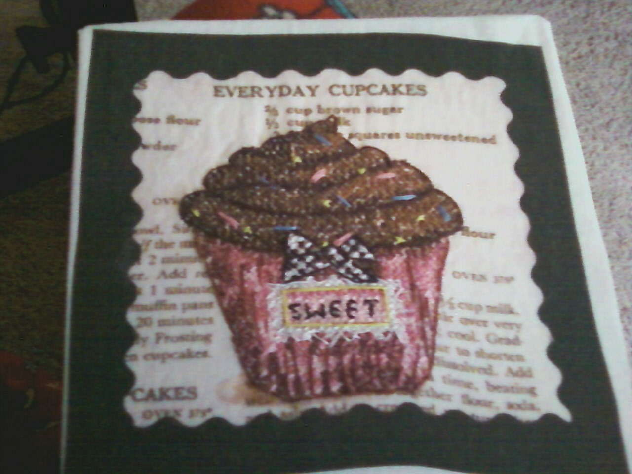 finished cross stitch cupcake