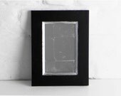 The Little Tuxedo Mirror